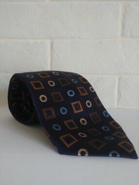 Montebello Italia 100% silk tie blue with brown geometric pattern